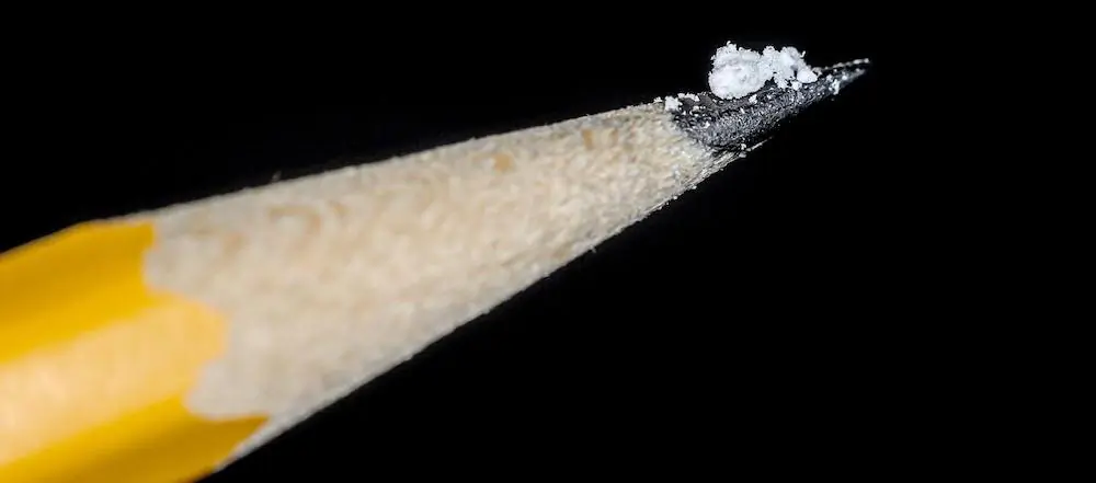 The U.S. Drug Enforcement Administration (DEA) found that 6 out of 10 illicit pills contain a lethal dose of fentanyl. A lethal dose is 2 mg., approximately the amount on the tip of this pencil. (Courtesy of DEA)