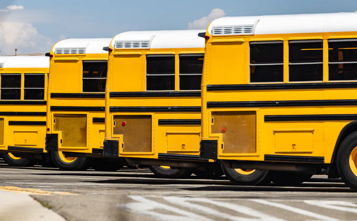 School buses sit parked at the Placentia Yorba Linda Unified School Disitrct offices in Placentia, Calif., on Aug. 15, 2023. (John Fredricks/The Epoch Times)