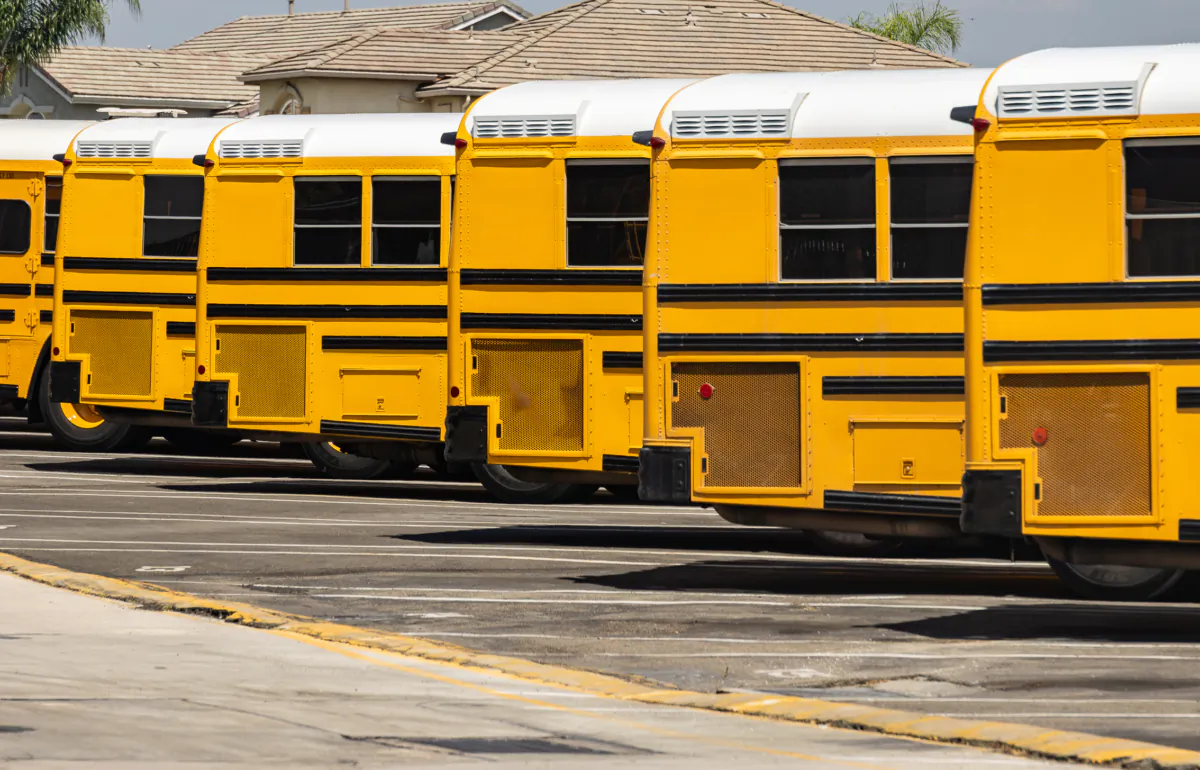 School buses sit parked at the Placentia Yorba Linda Unified School Disitrct offices in Placentia, Calif., on Aug. 15, 2023. (John Fredricks/The Epoch Times)
