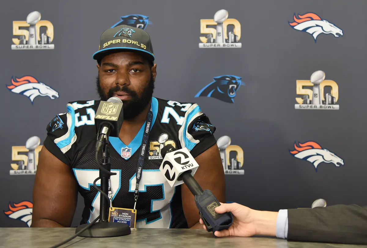 Tackle Michael Oher (73) of the Carolina Panther addresses the media prior to Super Bowl 50 at the San Jose Convention Center/ San Jose Marriott in San Jose, Calif., on Feb. 2, 2016. (Thearon W. Henderson/Getty Images)