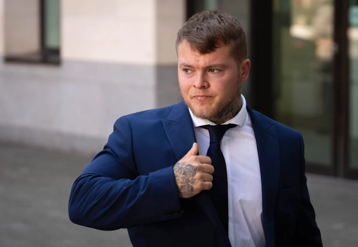 Former Surrey Police officer Adam Davies leaves Westminster Magistrates' Court, London, on Aug. 16, 2023. (James Manning/PA)