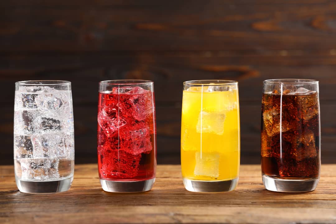 High consumption of sweetened beverages is linked to both increased chronic liver disease mortality risk and liver cancer risk. (New Africa/Shutterstock)