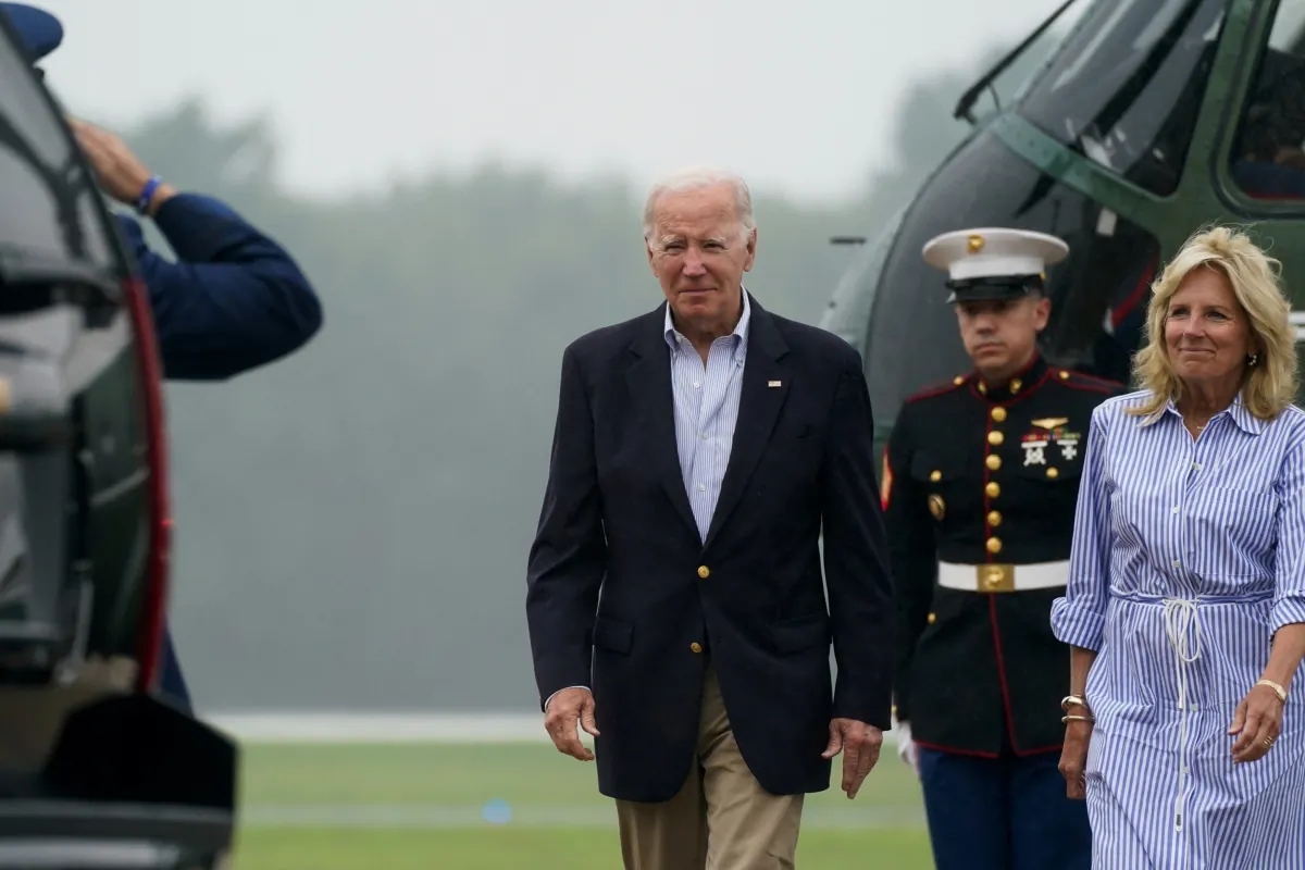 President Joe Biden and First Lady Jill Biden disembark from Marine One at Delaware Air National Guard Base en route to Wilmington in New Castle, Del., on Aug. 4, 2023. (Elizabeth Frantz/Reuters)