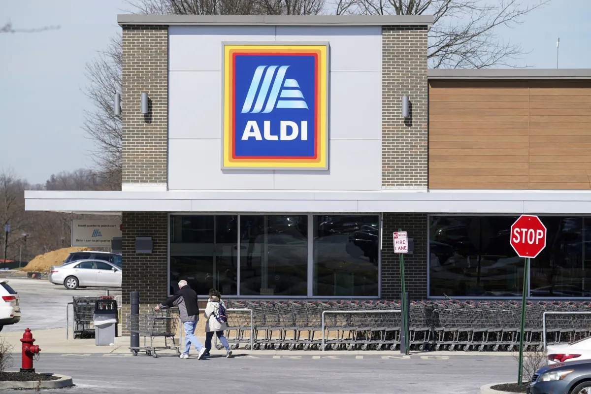 Customers walk into an Aldi supermarket in Bensalem, Pa., on March 14, 2022. (Matt Rourke/AP Photo)