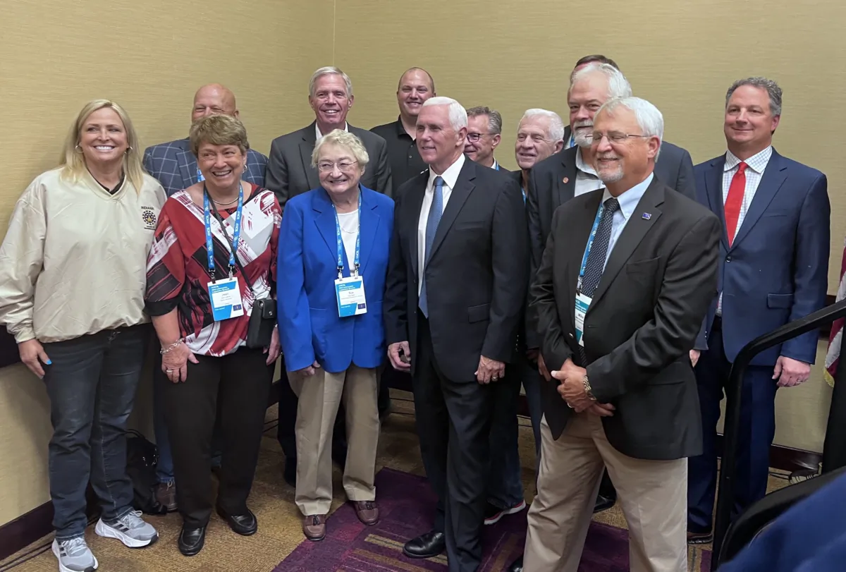 Former Vice President Mike Pence poses with Republican lawmakers from Indiana at the NCSL Summit in Indianapolis on Aug. 16, 2023. (Lawrence Wilson/The Epoch Times)