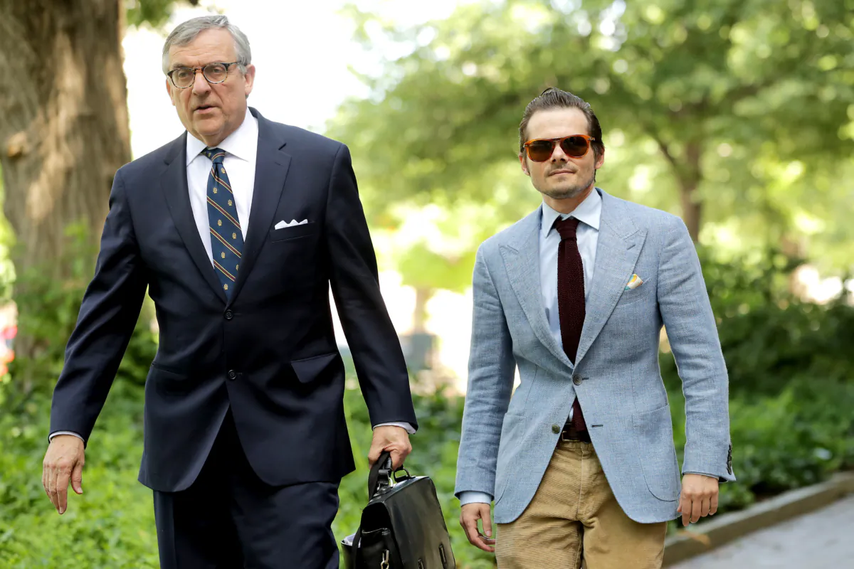 Andrew Miller (R), a former aide to political operative Roger Stone, and his lawyer Paul Kamenar arrive at the Prettyman U.S. Court House in Washington on May 31, 2019. (Chip Somodevilla/Getty Images)