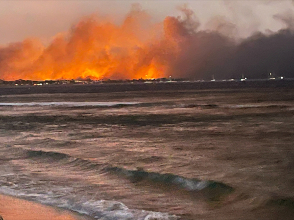A View Of Flames Near The Ocean At The Historic Town Of Lahaina