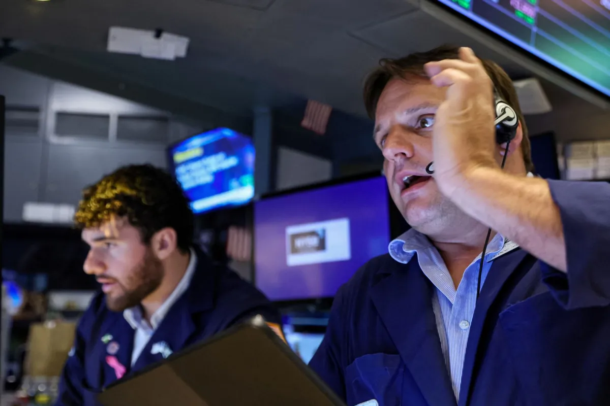 Traders work on the floor of the New York Stock Exchange (NYSE) in New York City on July 24, 2023. (Brendan McDermid/Reuters)