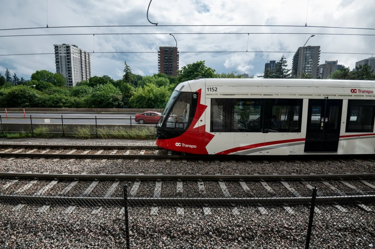 An Ottawa Light Rail Transit (LRT) train pulls into a station in Ottawa on July 24, 2022. (The Canadian Press/Spencer Colby)