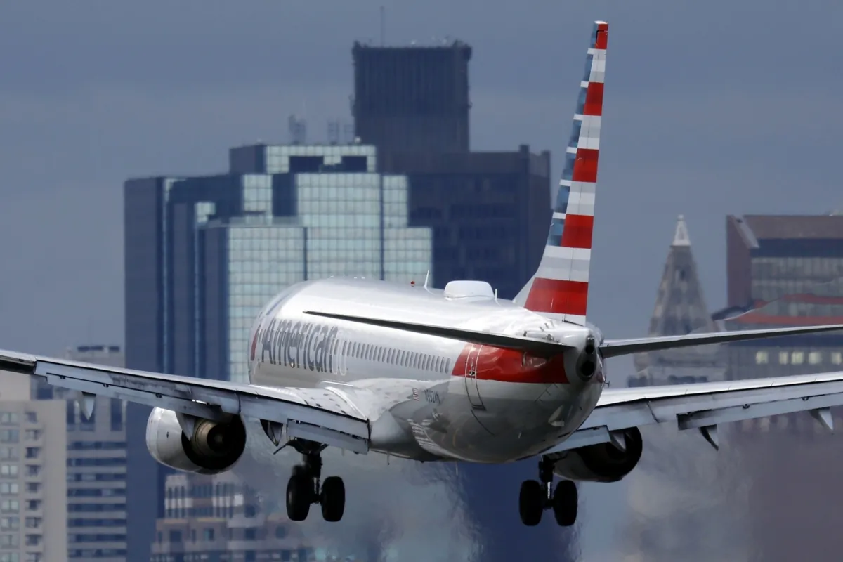 An American Airlines plane lands at Logan International Airport in Boston on Jan. 26, 2023. (Michael Dwyer/AP Photo)