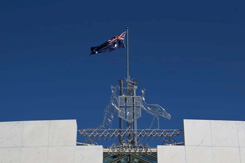 The Australian flag is seen at full mast on the forecourt of Parliament House in Canberra, Australia on Sept. 11, 2022. (Mick Tsikas - Pool/Getty Images)