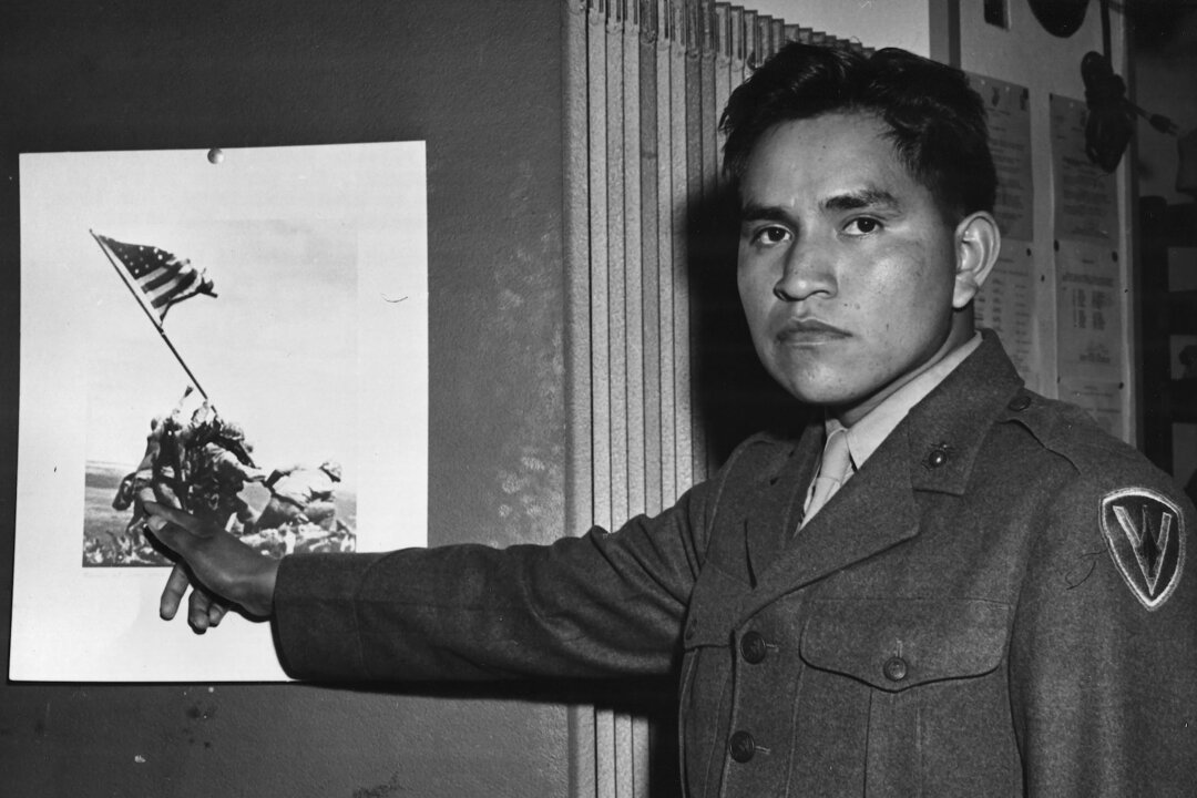 Ira Hayes and the image that made him famous and, perhaps, ruined his life. (Courtesy of Tom Holm)