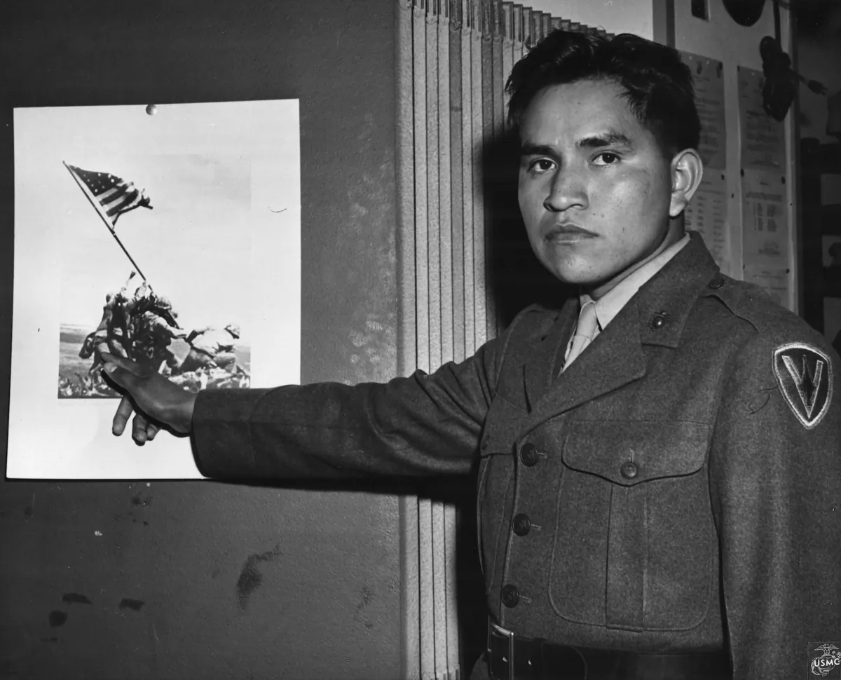 Ira Hayes and the image that made him famous and, perhaps, ruined his life. (Courtesy of Tom Holm)