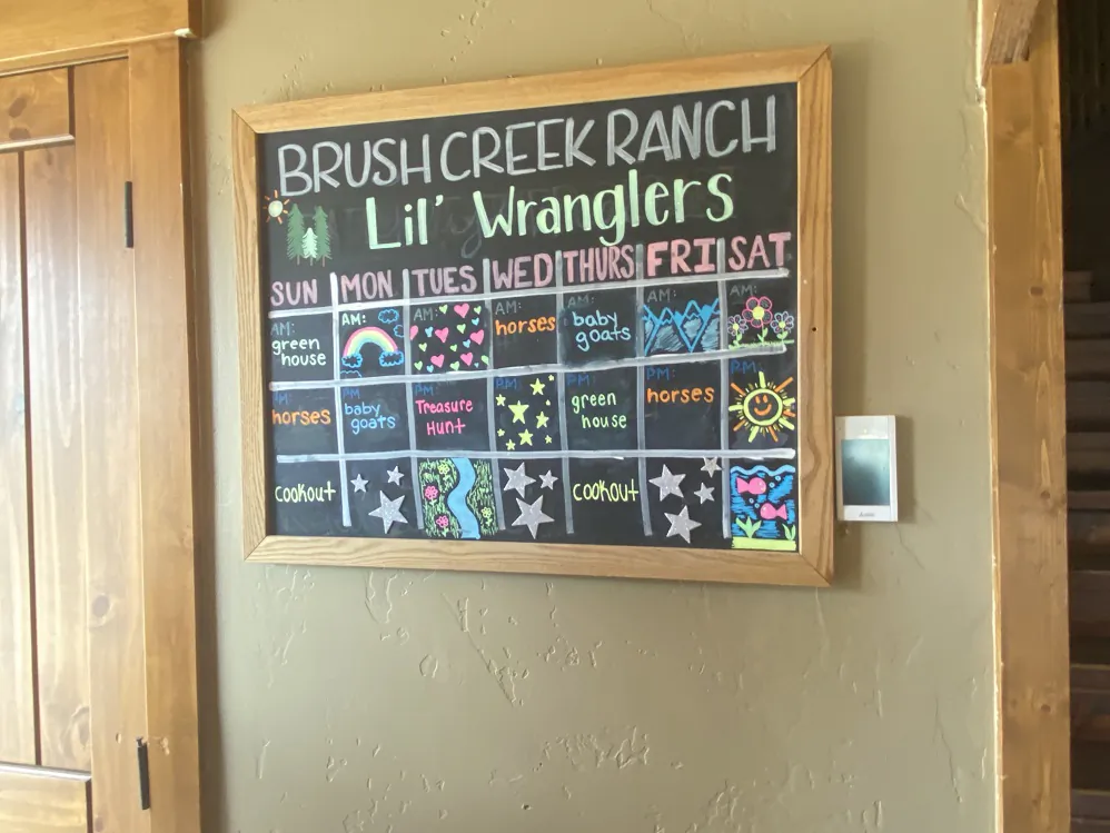 Activity board for Lil Wranglers, Brush Creek Ranch (Andy Yemma)