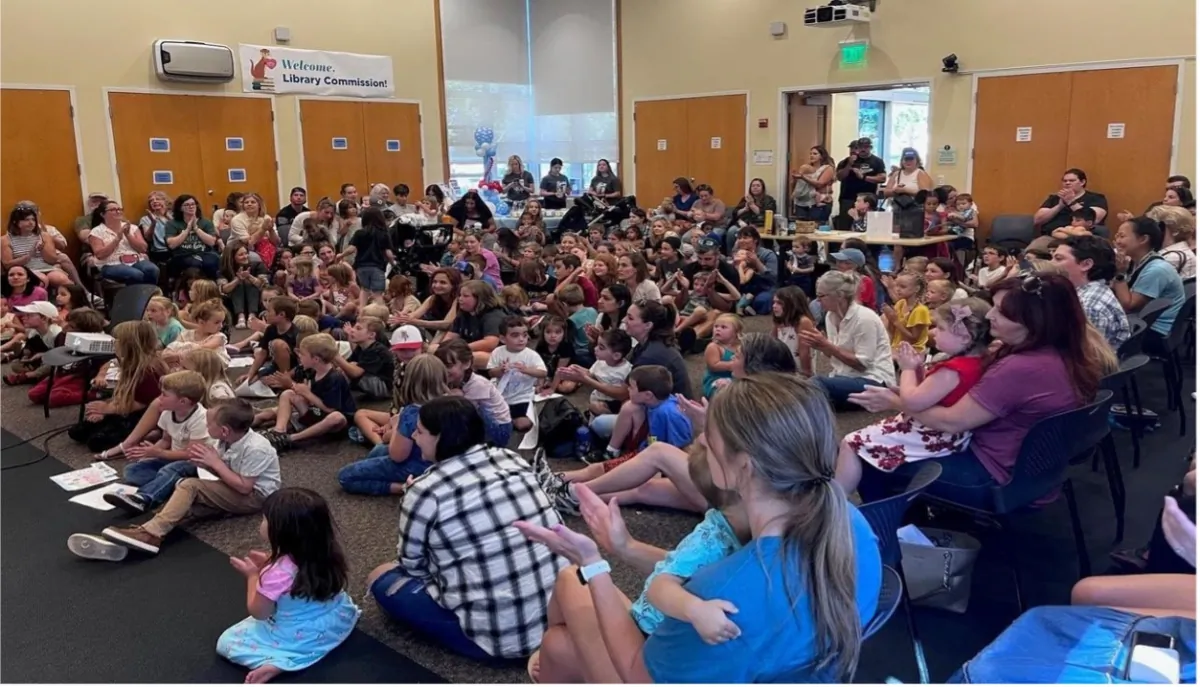 Over 100 children and adults inside the conference room at the Rohnert Park Library during the Sonoma County story hour in Rohnert Park, Calif., on Aug. 5, 2023. (Courtesy of Sarah Fenske)