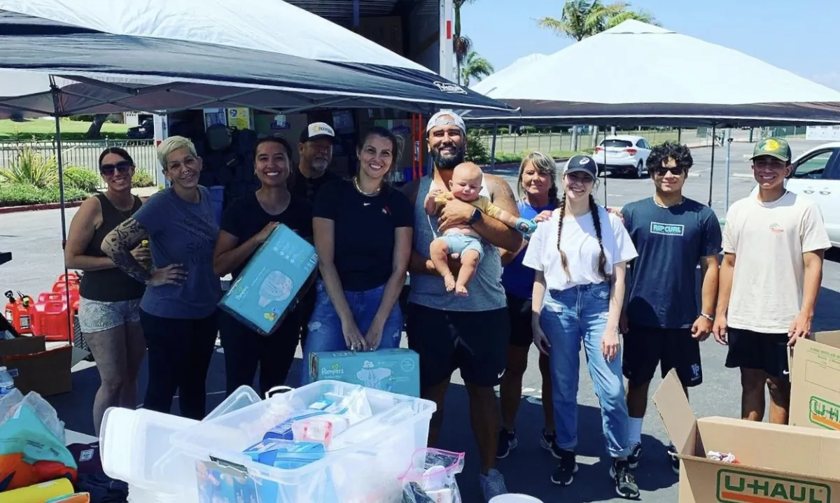 Kody Afusia (C) and others participate in relief efforts to aid victims of the Maui fires at Edison High School in Huntington Beach, Calif., on Aug. 14, 2023. (Courtesy of Kody Afusia)
