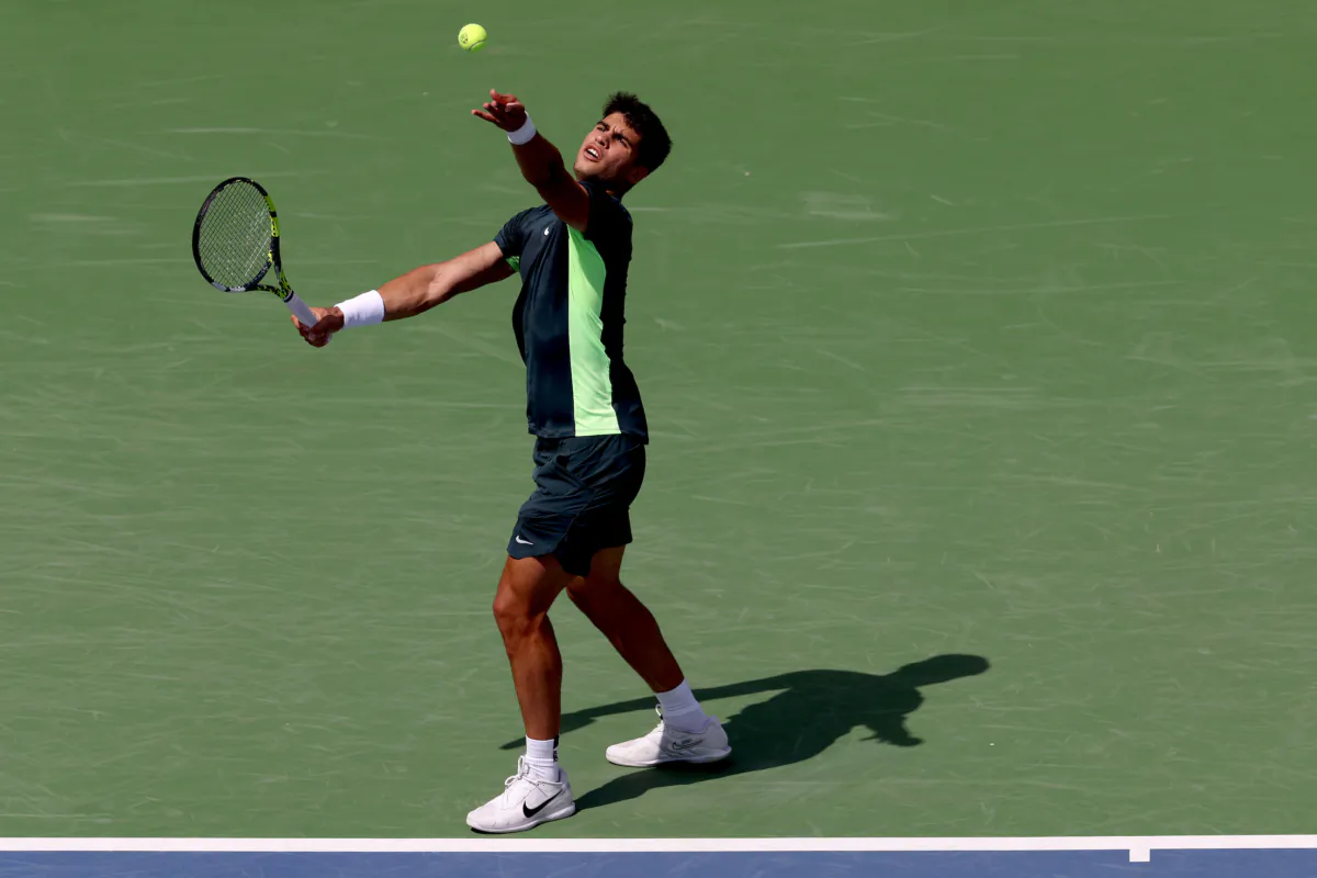 Carlos Alcarez of Spain serves to Tommy Paul during the Western & Southern Open at Lindner Family Tennis Center in Mason, Ohio, on August 17, 2023. (Matthew Stockman/Getty Images)