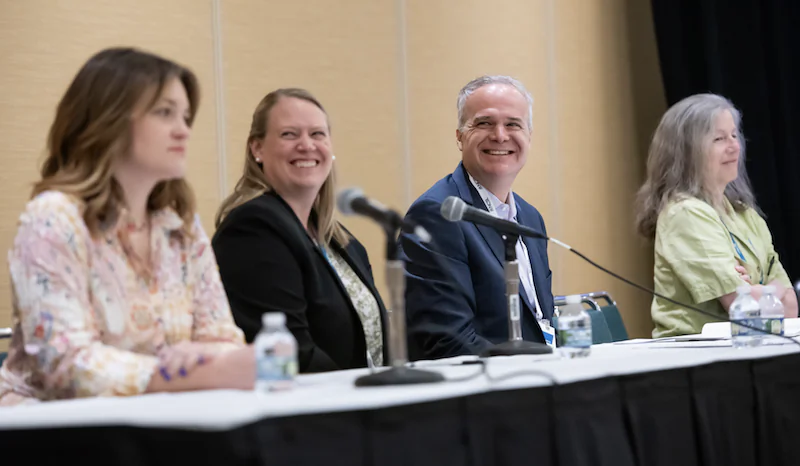 MultiState Vice President of Tax Policy Morgan Scarboro (L-to-R), National Conference of State Legislatures Policy Specialist Erica MacKellar, S&P Global Ratings Managing Director for U.S. Public Finance Geoffrey Buswick, and Federal Funds Information for States Executive Director Marcia Howard participate in a ‘Budget Jeopardy’ session Aug. 14, 2023 during the three-day National Conference of State Legislatures 2023 Legislative Summit in Indianapolis, Ind., attended by more than 5,000 state lawmakers, legislative staffers, lobbyists, and advocates. (National Conference of State Legislatures) 
