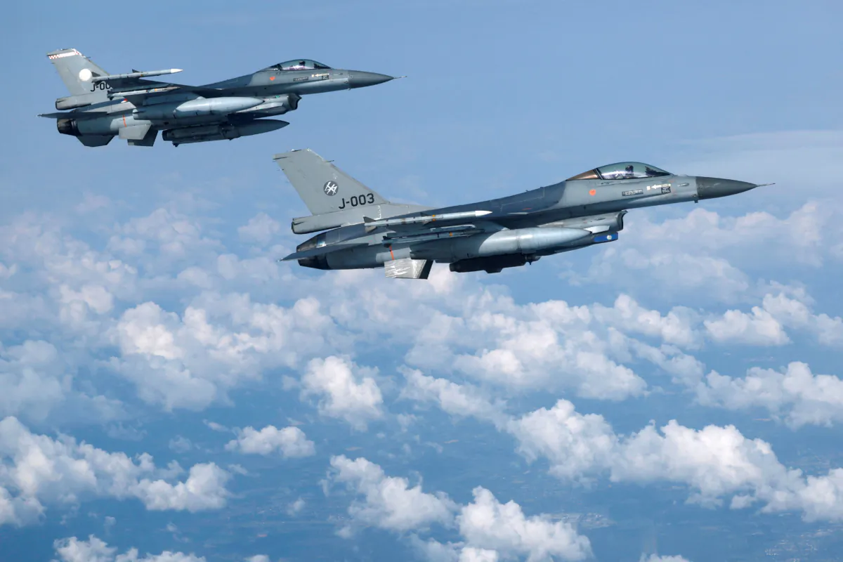 Netherlands' Air Force F-16 fighter jets fly during a media day illustrating how NATO Air Policing safeguards the Allies' airspace in the northern and northeastern region of the Alliance on July 4, 2023. (Piroschka van de Wouw/Reuters)