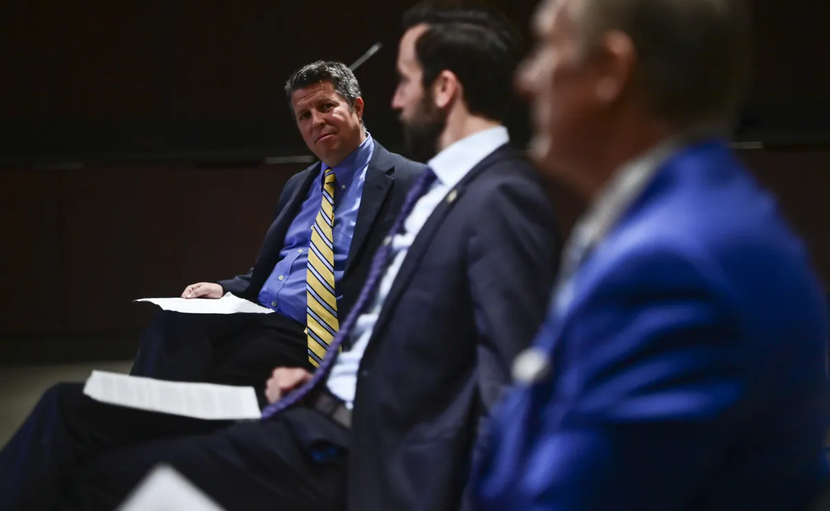 Pastor Michael Thiessen, left to right, then federal MP Derek Sloan and People's Party leader Maxime Bernier wait to hold a press conference on Parliament Hill in Ottawa on April 15, 2021, to discuss their "End the Lockdown Caucus." (THE CANADIAN PRESS/Sean Kilpatrick)