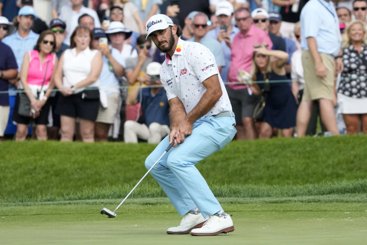 Max Homa reacts as he misses a birdie-attempt on the 18th green during the second round of the BMW Championship golf tournament, in Olympia Fields, Ill., on Aug. 18, 2023. (Charles Rex Arbogast/AP Photo)
