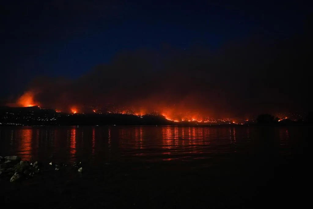 British Columbia is imposing bans on travel to wildfire zones after evacuee numbers doubled to 30,000 or more, on a day of dramatic developments in the province's desperate battle against hundreds of blazes. (The Canadian Press/Darryl Dyck)