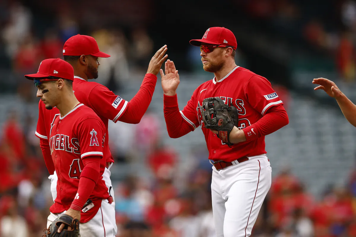 Brandon Drury (23) of the Los Angeles Angels celebrates a win against the Tampa Bay Rays during game one of a doubleheader at Angel Stadium of Anaheim in Anaheim, Calif., on August 19, 2023. (Ronald Martinez/Getty Images)