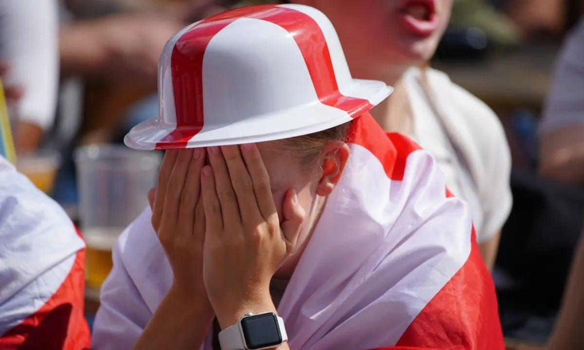 A England fan reacts to the penalty given to Spain during a screening of the FIFA Women's World Cup 2023 final between England and Spain at Piccadilly Gardens, Manchester, on Aug. 20, 2023. (Peter Byrne/PA)