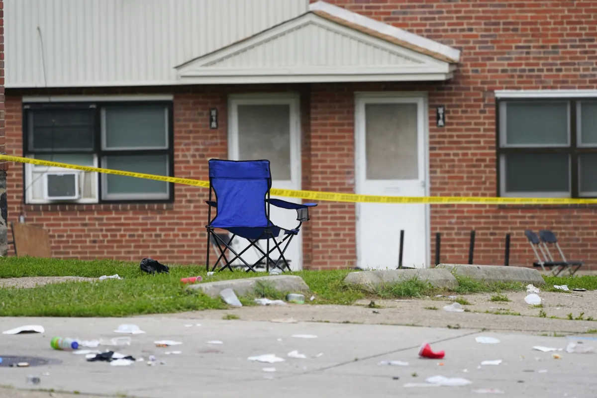 A chair remains upright in the area of a shooting incident in the Southern District of Baltimore on July 2, 2023. (Julio Cortez/AP Photo)