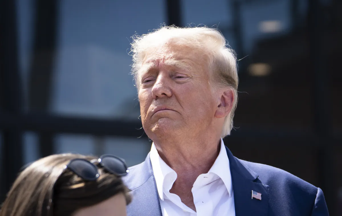 Former President Donald Trump leaves the Iowa State Fair in Des Moines, Iowa, on Aug. 12, 2023. (Madalina Vasiliu/The Epoch Times)