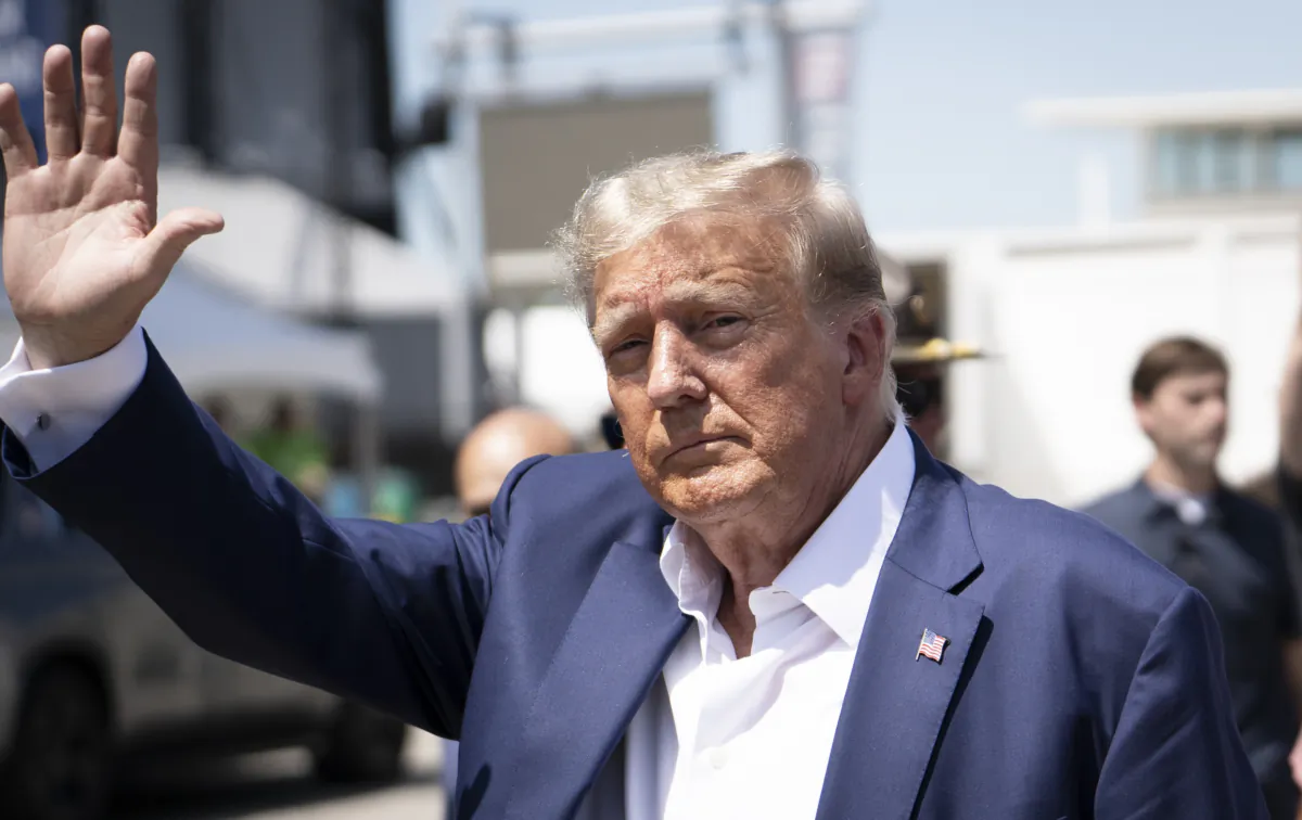 Former President Donald Trump leaves the Iowa State Fair in Des Moines on Aug. 12, 2023. (Madalina Vasiliu/The Epoch Times)