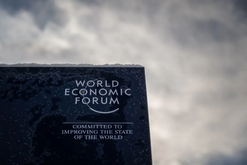 A sign of the World Economic Forum (WEF) in the alpine resort of Davos, on the opening day of the annual meeting in Davos on Jan. 16, 2023. (Fabrice Coffrini/AFP via Getty Images)