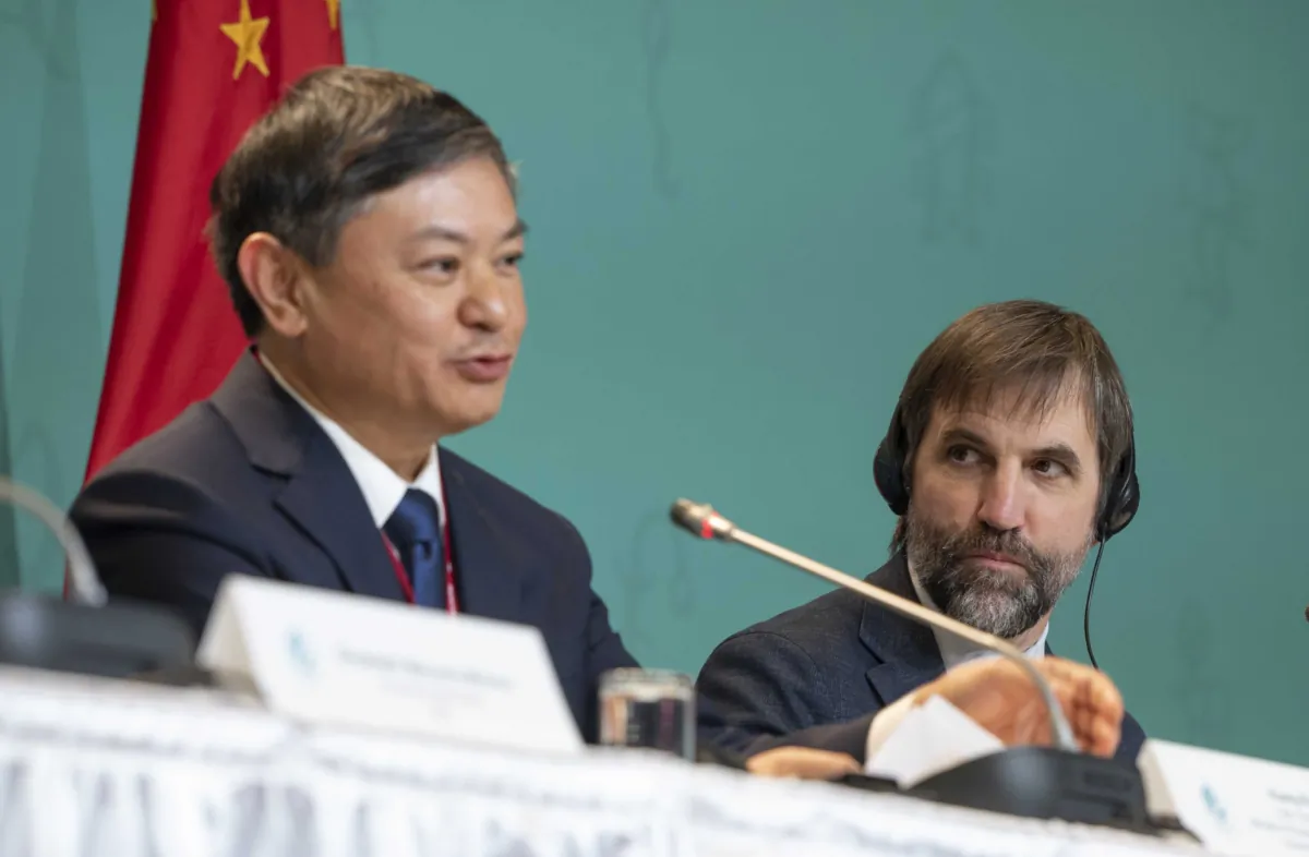 Huang Runqiu (L), COP15 president and Chinese ecology and environment minister, speaks as Steven Guilbeault, Canadian environment and climate change minister, looks on during a press conference at the COP15 summit on biodiversity, in Montreal, on Dec. 17, 2022. (Peter McCabe/The Canadian Press)