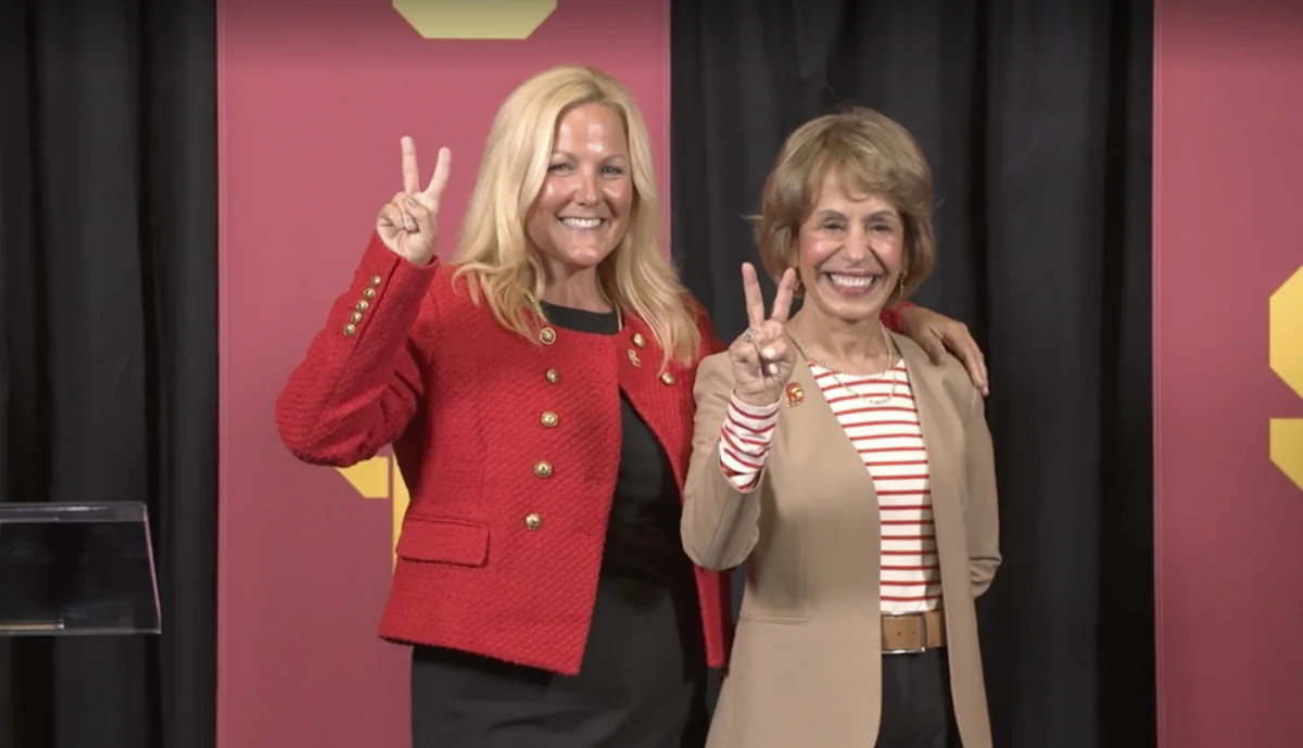 University of Southern California President Carol Folt, right, poses with the newly hired Athletic Director Jennifer Cohen, left, during a press conference announcing Ms. Cohen's hiring in Los Angeles on Aug. 21, 2023. (The University of Southern California/Screenshot via The Epoch Times)
