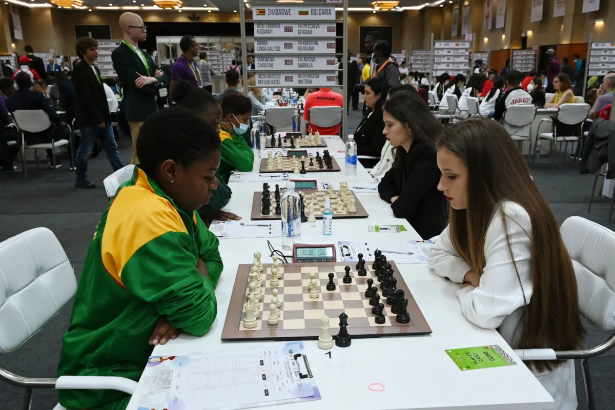 Chess players representing Zimbabwe (L) play against players representing Bulgaria (R)  during the 44th Chess Olympiad 2022 in Mahabalipuram, India, on July 29, 2022. (Arun Sankar/AFP via Getty Images)