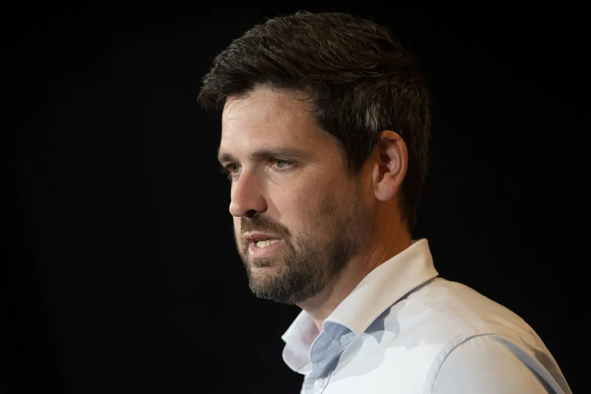 Sean Fraser, the federal Minister of Housing, Infrastructure, and Communities, speaks to reporters during the Liberal Cabinet retreat in Charlottetown, on Aug. 21, 2023. (The Canadian Press/Darren Calabrese)