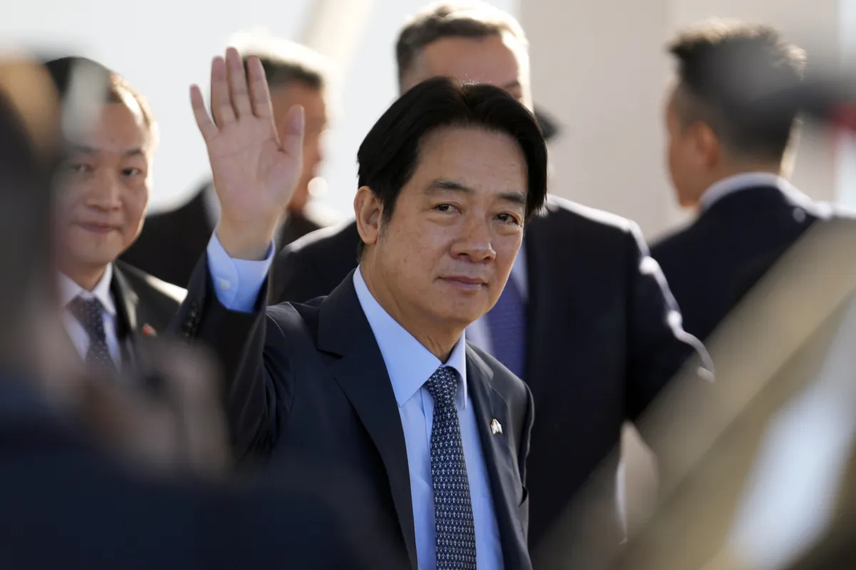 Taiwan's Vice President William Lai Ching-te waves after landing at Silvio Pettirossi airport in Luque, Paraguay, on Aug. 14, 2023. Mr. Lai is in Paraguay for the inauguration of President-elect Santiago Pena on Aug. 15. (AP Photo/Jorge Saenz)