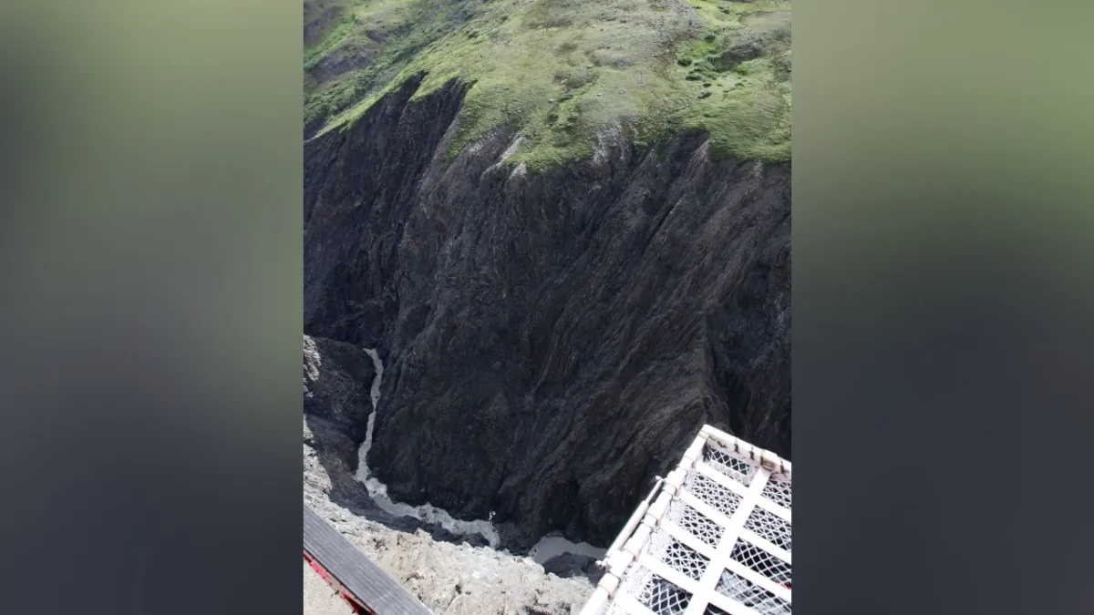 A ravine on a tributary of the West Fork of the Yenta River inside Alaska's Denali National Park and Preserve where a small airplane crashed, killing a pilot and a hunter on Aug. 10, 2023. (National Park Service via AP)