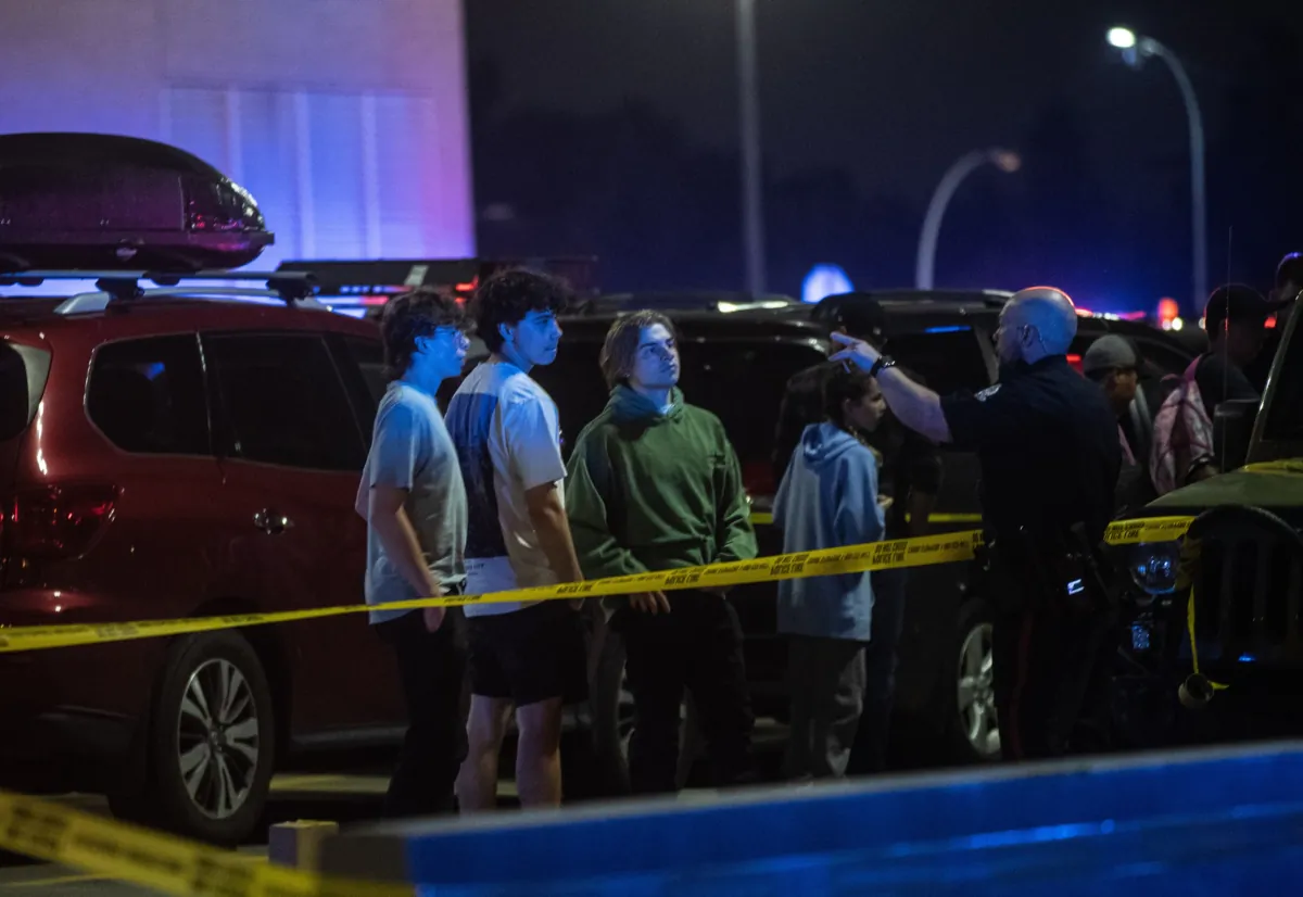 Police investigate the scene of a multiple shooting at West Edmonton Mall in Edmonton, Alberta on Aug. 21, 2023. Police say three people have been seriously injured in a shooting at West Edmonton Mall.
(Jason Franson/The Canadian Press)