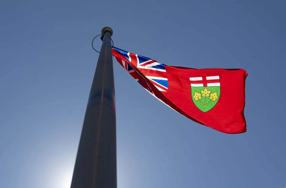 Ontario's provincial flag flies in Ottawa, on July 6, 2020. (The Canadian Press/Adrian Wyld)