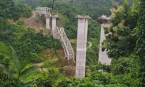 Construction Platform at Railroad Bridge Being Built in India Collapses, Killing at Least 26 Workers
