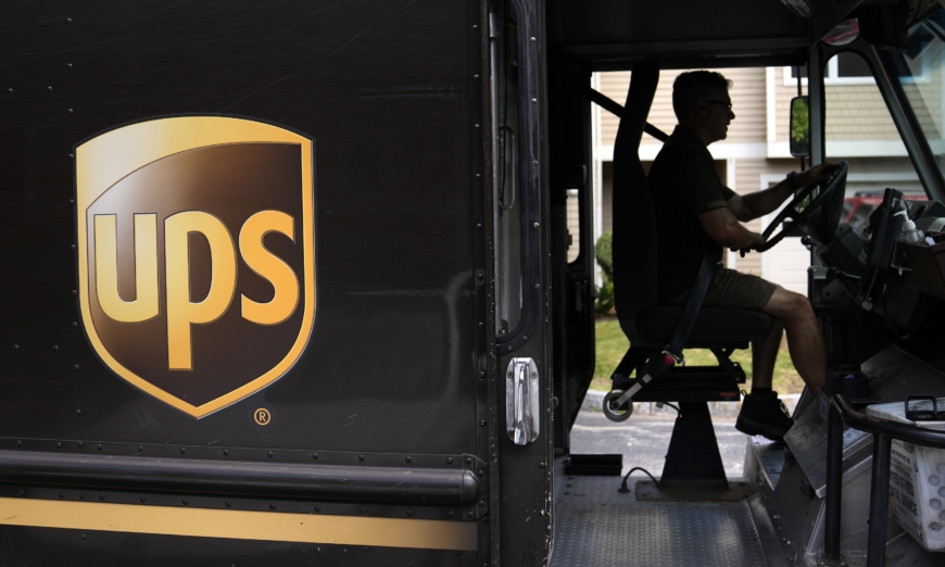 Teamsters approve UPS contract, removing strike threat.
