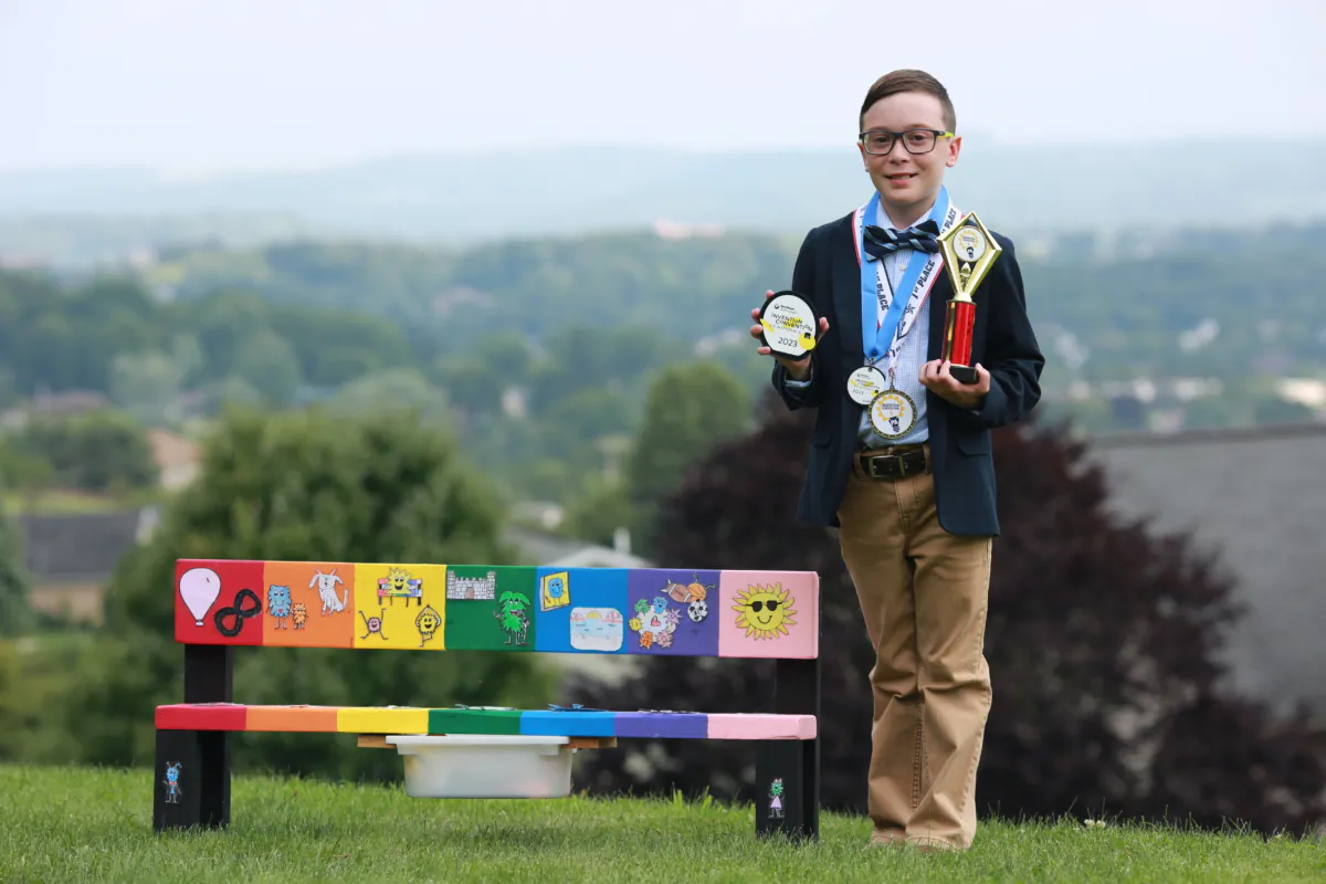 Avery Schneider, 9, with his award-winning invention. (Justin Lowry)