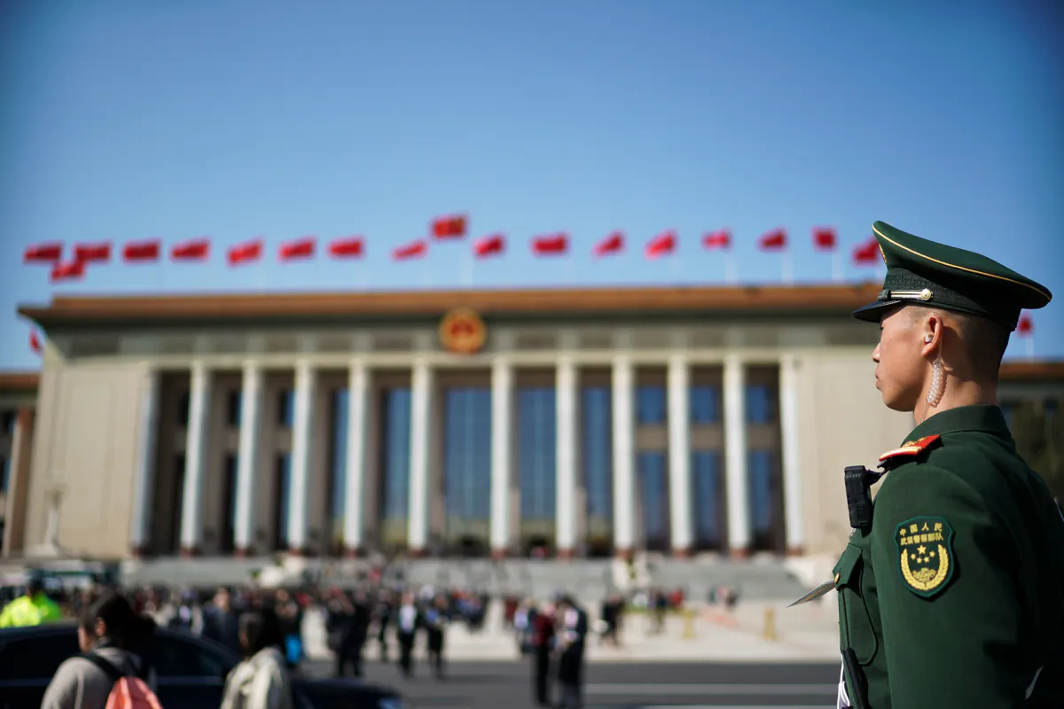 A Chinese paramilitary policeman stands guard at Tiananmen Square during the opening session of China's rubber-stamp legislature, the National People's Congress, in Beijing, on March 5, 2019. Lintao Zhang/Getty Images)