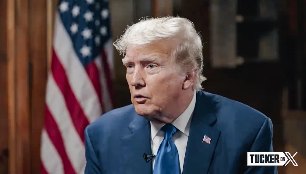 Former president Donald Trump speaks with Tucker Carlson in a pre-recorded interview aired on debate night on Aug. 23, 2023. (Tucker Carlson/X)