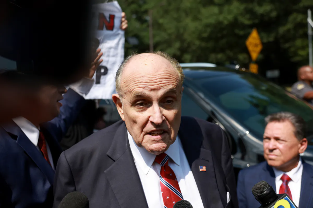 Rudy Giuliani speaks to the media after leaving the Fulton County jail in Atlanta, Ga., on Aug. 23, 2023. (Joe Raedle/Getty Images)