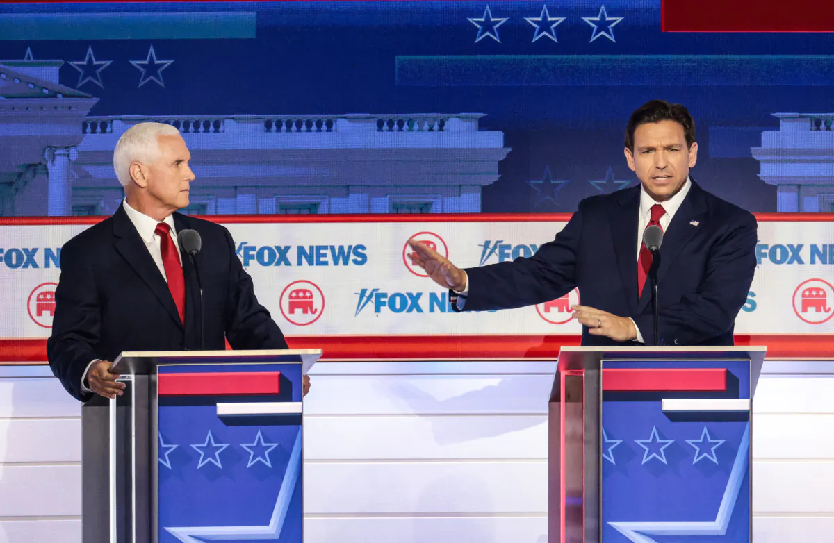 Republican presidential candidates (left-right), former Vice President Mike Pence and Florida Gov. Ron DeSantis participate in the first debate of the GOP primary season hosted by FOX News at the Fiserv Forum in Milwaukee, Wis., on Aug. 23, 2023. (Win McNamee/Getty Images)