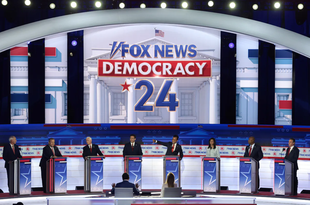 Republican presidential candidates (L-R), former Arkansas Gov. Asa Hutchinson, former New Jersey Gov. Chris Christie, former U.S. Vice President Mike Pence, Florida Gov. Ron DeSantis, Vivek Ramaswamy, former U.N. Ambassador Nikki Haley, U.S. Sen. Tim Scott (R-S.C.) and North Dakota Gov. Doug Burgum participate in the first debate of the GOP primary season hosted by FOX News at the Fiserv Forum in Milwaukee, Wis., on Aug. 23, 2023. (Win McNamee/Getty Images)