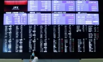 Shares Rise, Dollar Drops Versus Yen After BOJ Hint of Exit From Negative Rates