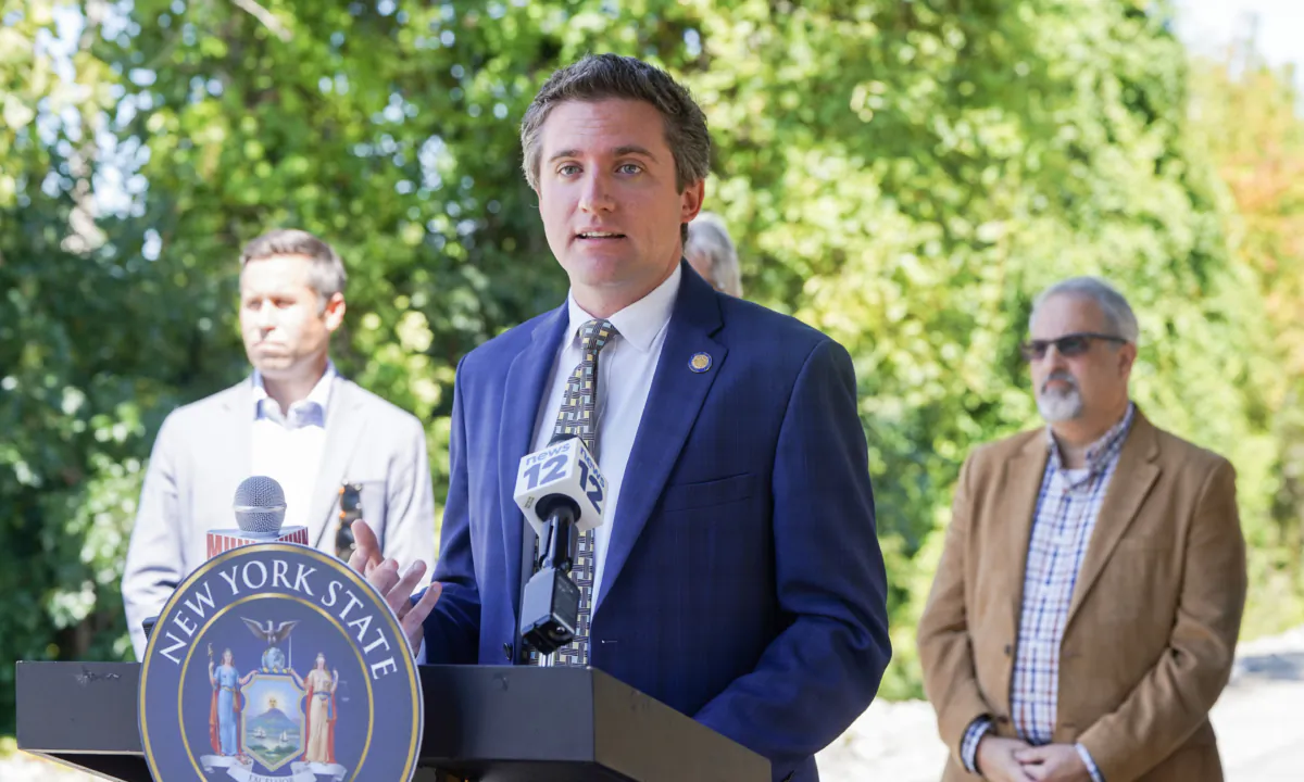 New York state Senator James Skoufis speaks at a press conference in front of Harriman Train Station in New York on Aug. 23, 2023. (Cara Ding/The Epoch Times)